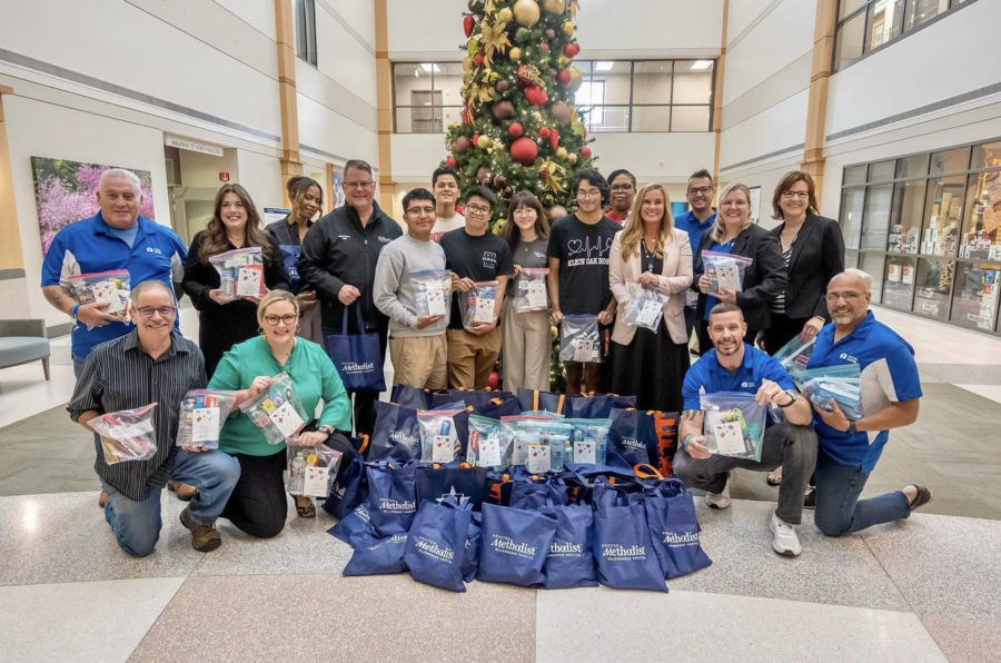 The HOSA student representatives posed with Dr. Jenny McGown, CTE representatives and Willowbrook Methodist employees along with 450 packs of survival kits.