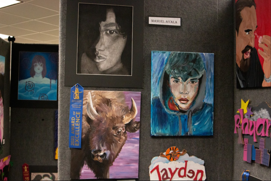 Top left drawing created by junior Manuel Ayala. Bottom left is an award winning cow painting by senior Loan Ha. The painting on the right is a self-portrait by junior Jaime Villarreal.